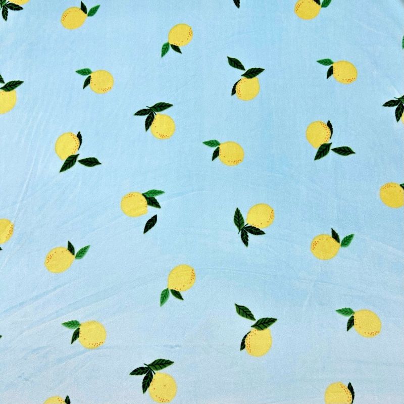 Lemons on Blue Fleece Jersey Fabric