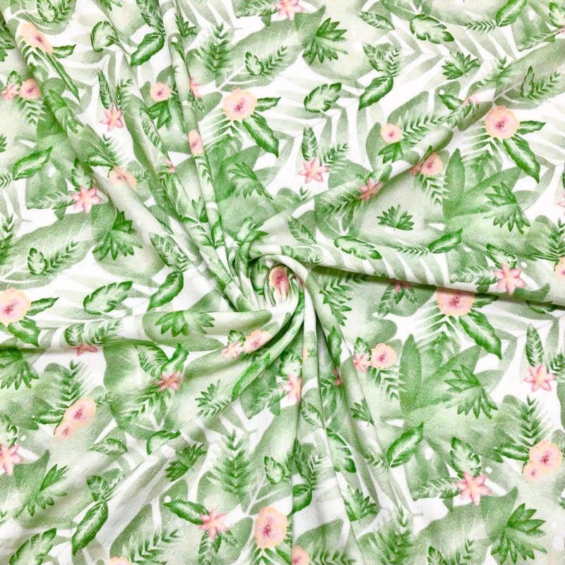 Pink Flowers and Leaves on White Pointelle Jersey Fabric