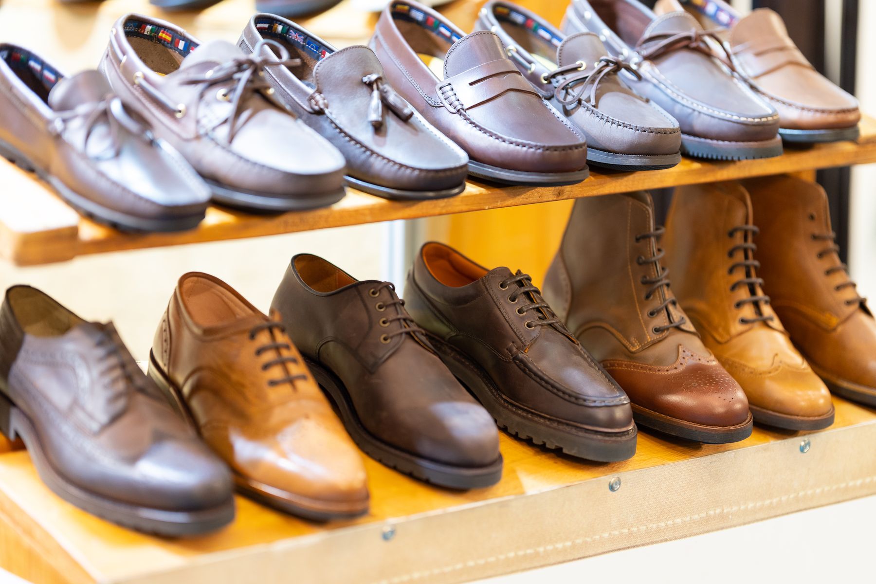 Leather shoes displayed on shelves